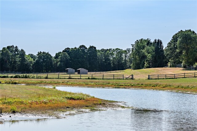 view of water feature with a rural view