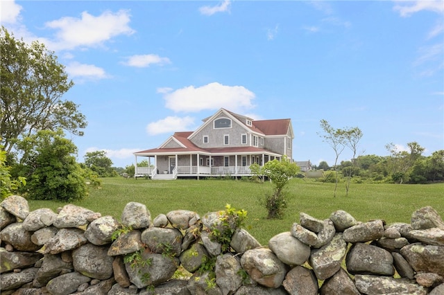 farmhouse with a front yard