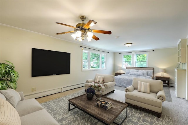 bedroom featuring ceiling fan, crown molding, and a baseboard radiator