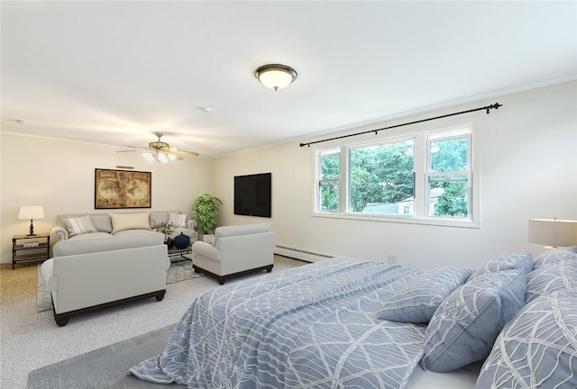 bedroom featuring baseboard heating, carpet floors, and ceiling fan