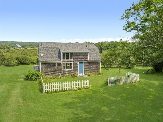 view of front of home with a front yard