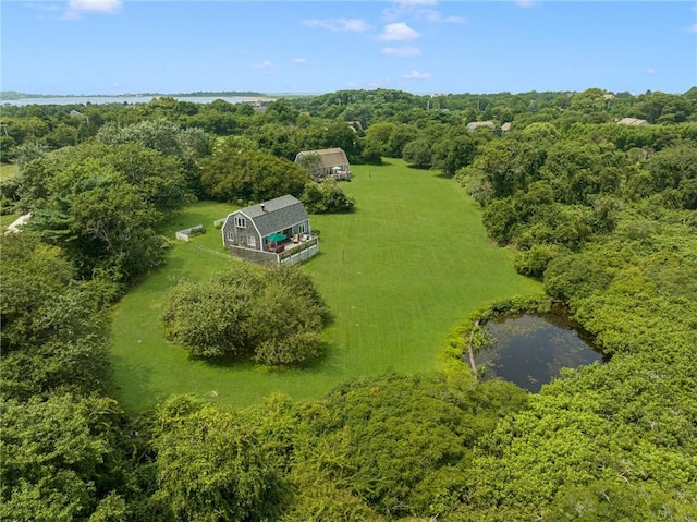 681 Corn Neck Rd, Block Island, RI 02807 - aerial view of property and surrounding area with a nearby body of water and a heavily wooded area
