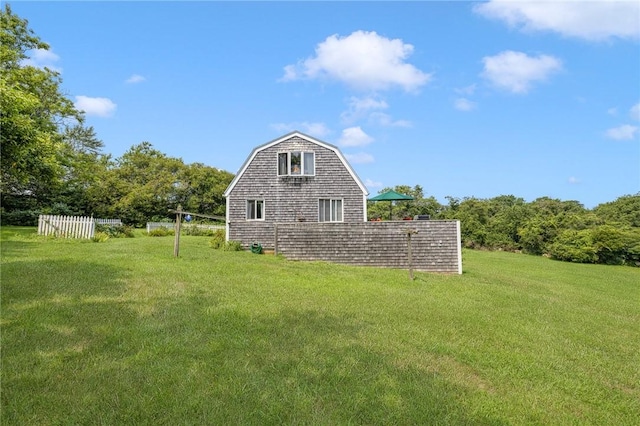 681 Corn Neck Rd, Block Island, RI 02807 - view of home's exterior featuring a barn, a gambrel roof, and an outdoor structure