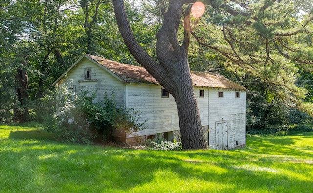 exterior space with a yard