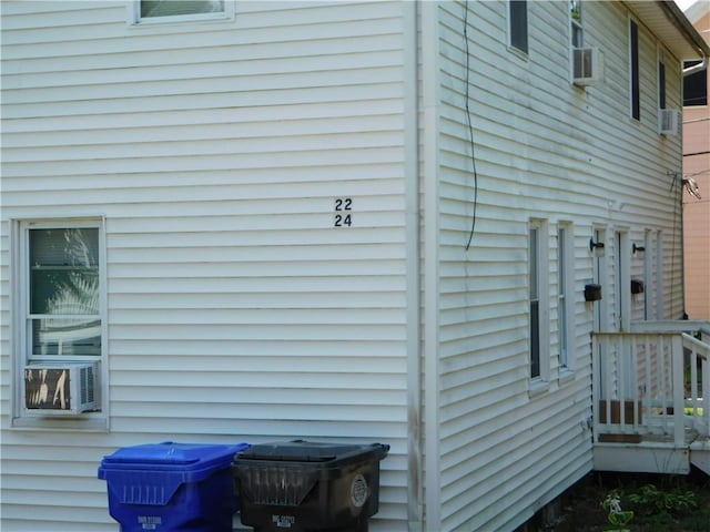 view of side of property featuring cooling unit