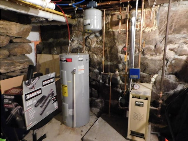 utility room with water heater