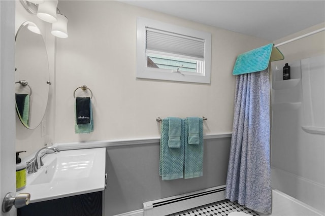 bathroom with vanity, a baseboard radiator, and shower / bathtub combination with curtain