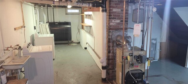 basement with washing machine and dryer