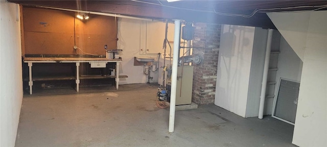 basement with a workshop area