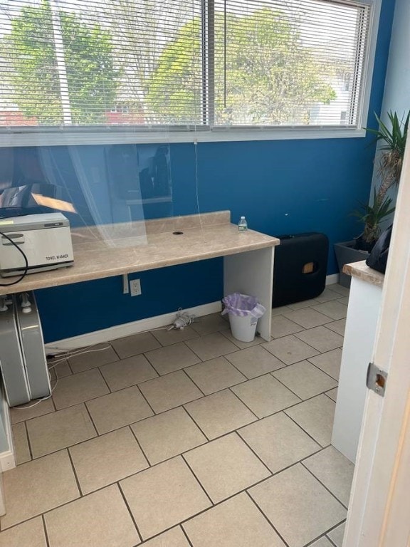 bathroom with tile patterned flooring