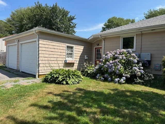 view of property exterior featuring a yard