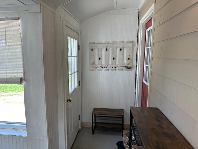 mudroom with lofted ceiling