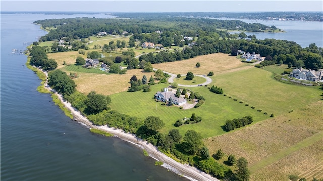 drone / aerial view featuring a water view and a rural view