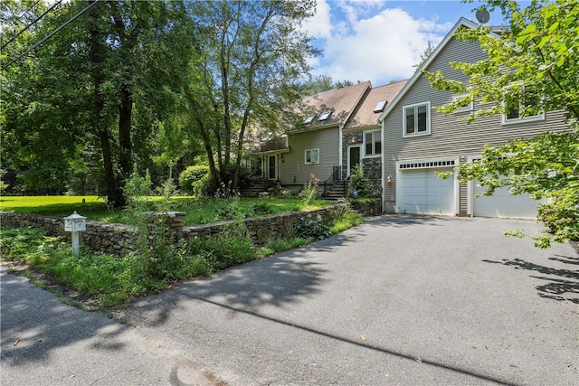 view of front of home featuring a garage