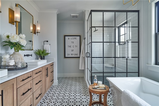 bathroom with vanity, crown molding, tile patterned flooring, and independent shower and bath