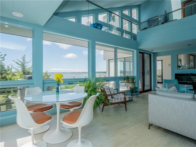 sunroom / solarium featuring a wealth of natural light