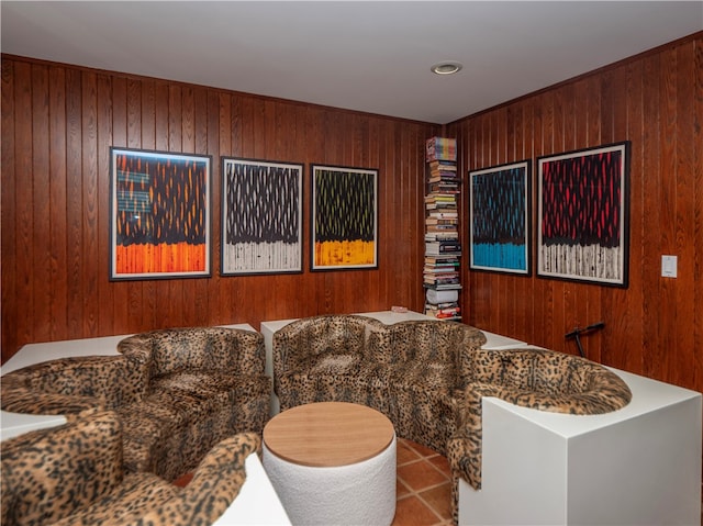 bathroom with wooden walls and tile patterned flooring