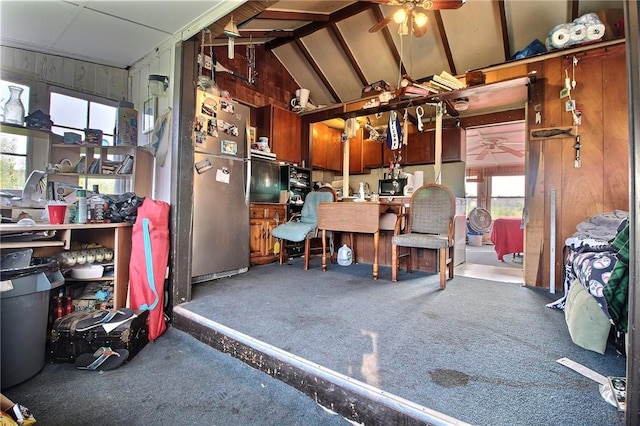 853 W Beach Rd, Charlestown, RI 02813 - interior space featuring lofted ceiling, wooden walls, ceiling fan, and plenty of natural light
