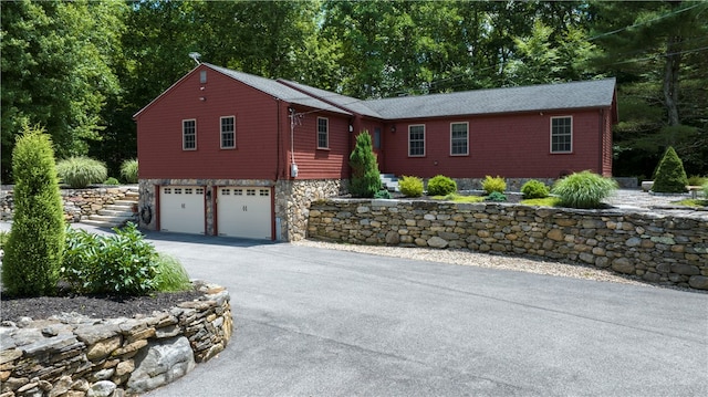 single story home with a garage