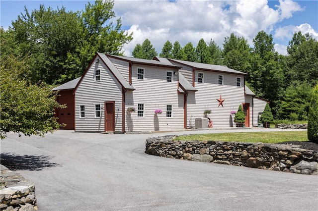 front of property featuring a garage