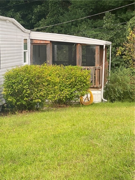 exterior space featuring a lawn