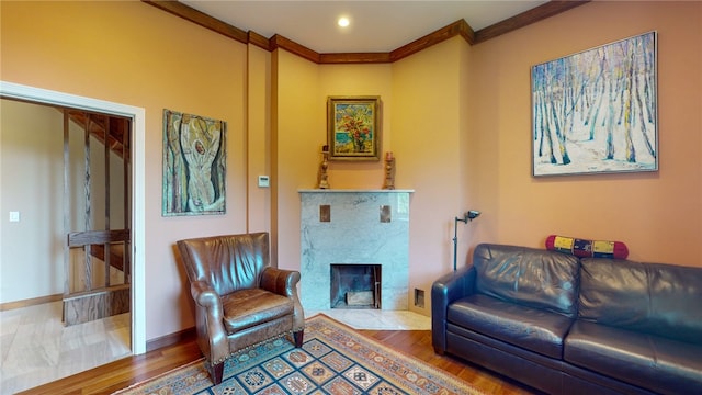 living room featuring crown molding and wood-type flooring