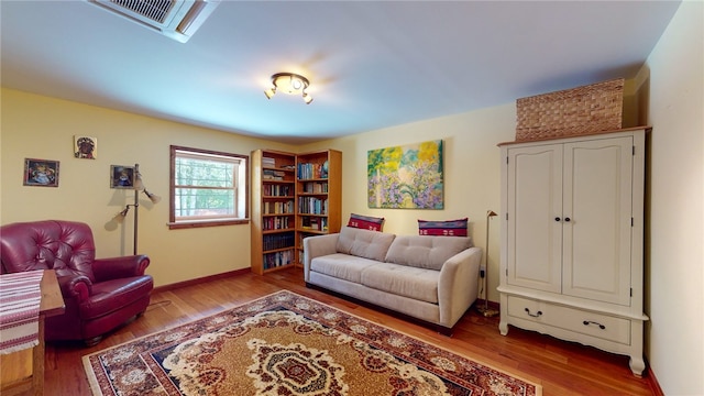 living room with hardwood / wood-style flooring