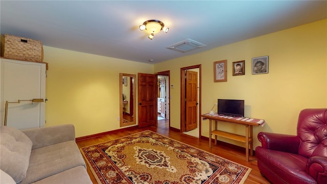 living room with wood-type flooring