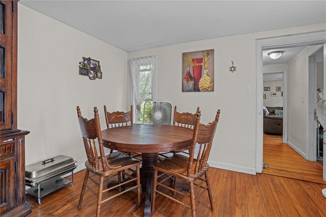 dining room featuring light wood-type flooring