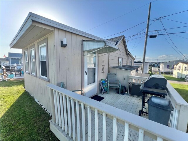 deck featuring a yard