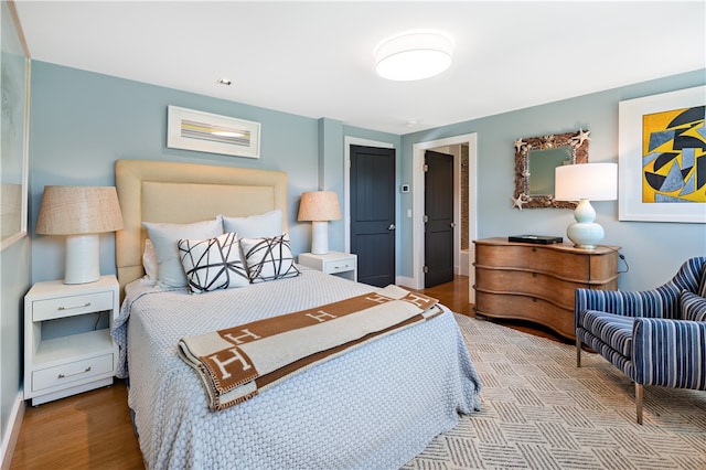 bedroom featuring hardwood / wood-style floors