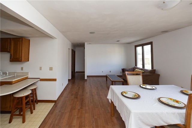 dining area featuring hardwood / wood-style flooring