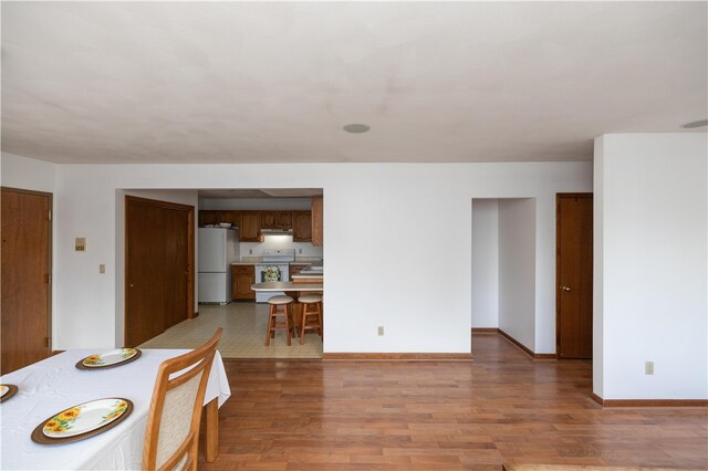 dining room featuring light hardwood / wood-style flooring