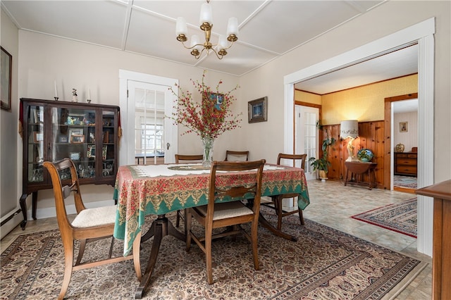 dining space with an inviting chandelier