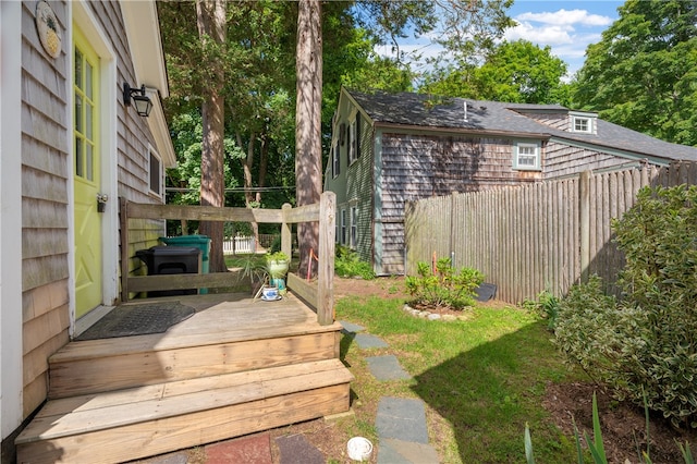 view of yard with a wooden deck