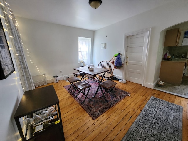 dining area featuring wood-type flooring