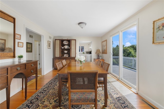 dining area featuring light hardwood / wood-style floors