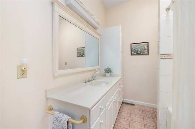 bathroom featuring vanity, tile patterned floors, and plus walk in shower