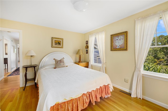 bedroom featuring light hardwood / wood-style flooring