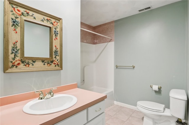 full bathroom with tile patterned flooring, vanity, toilet, and  shower combination