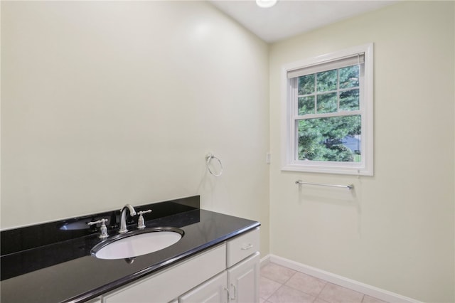 bathroom with vanity and tile patterned floors