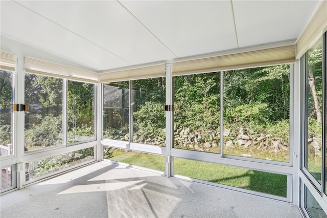 unfurnished sunroom featuring a wealth of natural light