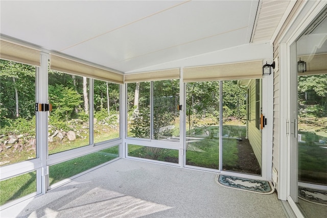 unfurnished sunroom featuring a wealth of natural light