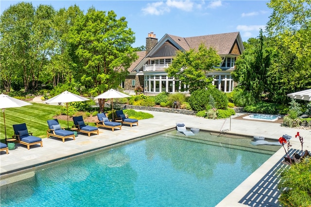 exterior space with a patio area and a diving board