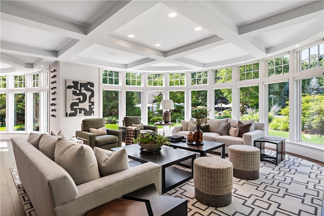 sunroom / solarium with coffered ceiling, plenty of natural light, and beamed ceiling