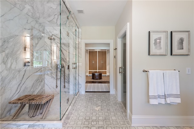 bathroom with an enclosed shower