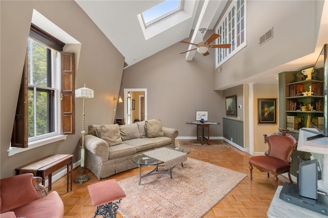 living room featuring high vaulted ceiling, ceiling fan, plenty of natural light, and light parquet floors