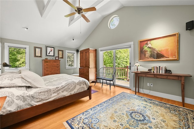 bedroom with light wood-type flooring, multiple windows, ceiling fan, and access to exterior