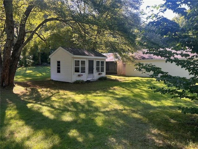 505 Central St, Burrillville, RI 02839 - view of grassy yard featuring an outbuilding
