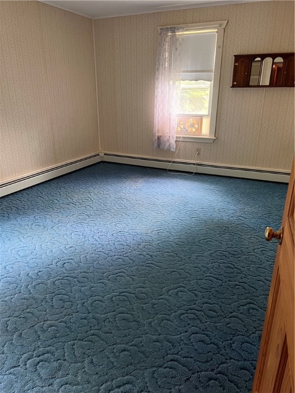 spare room with dark carpet